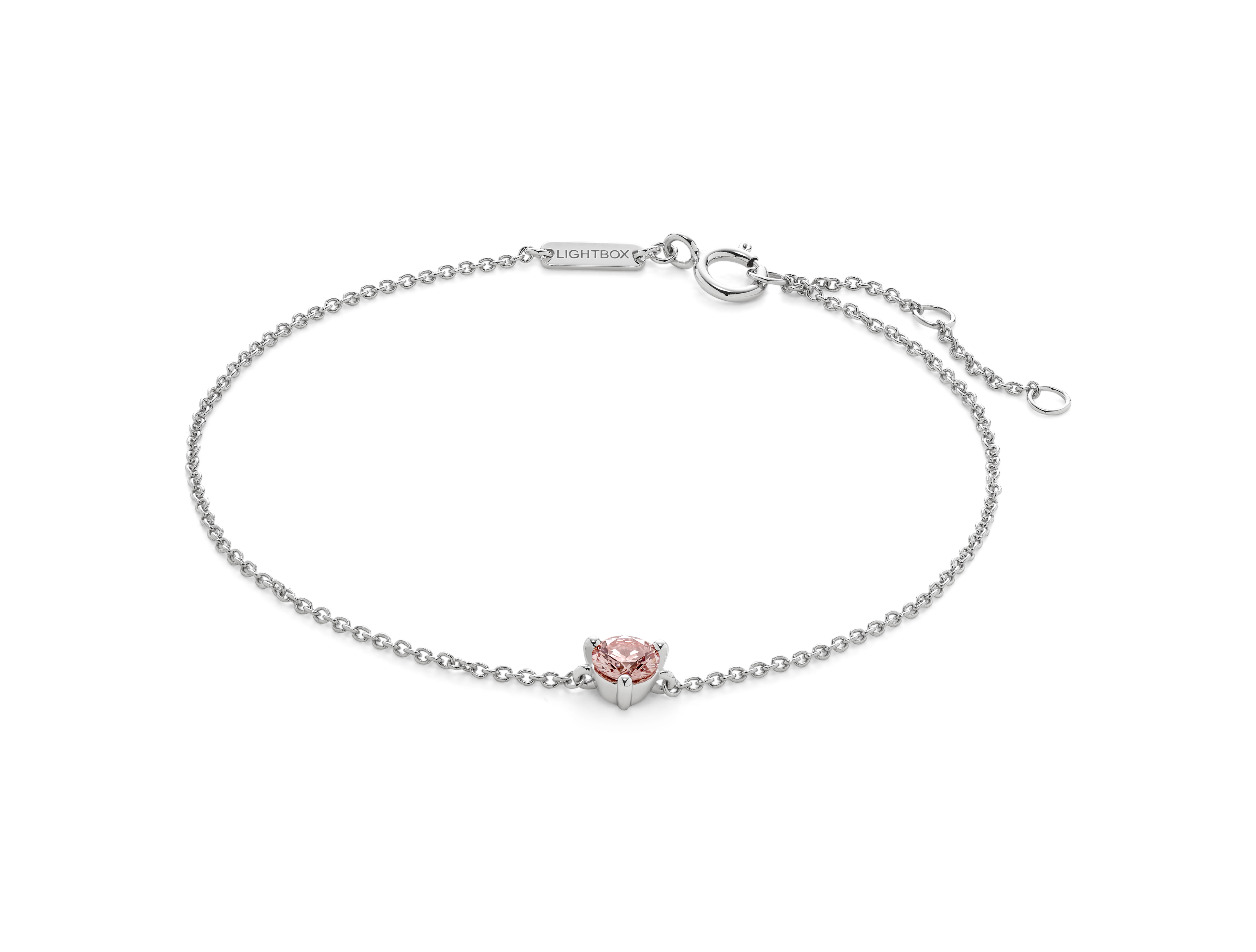 Front view of pink 0.25 carat round brilliant solitaire bracelet in 14k white gold