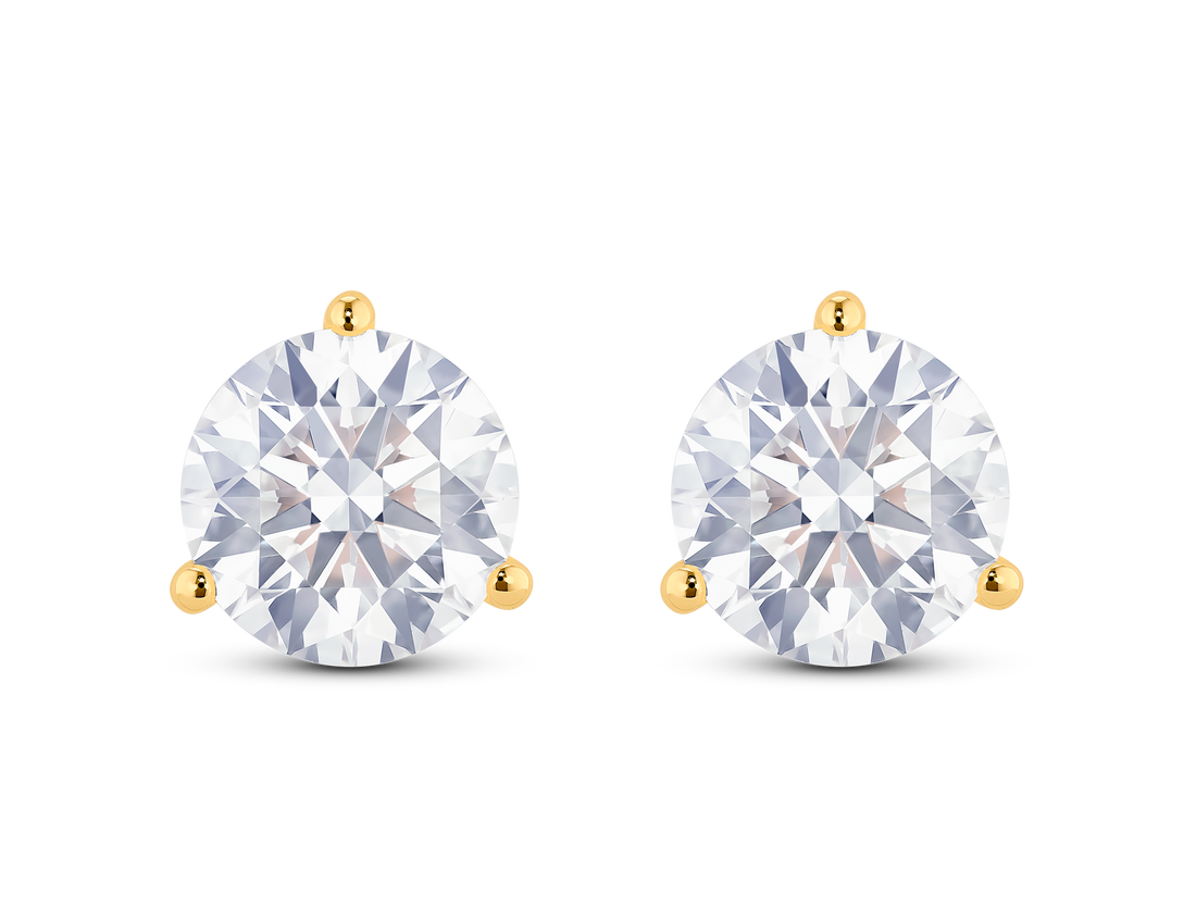 Front view of 3½ carat total weight round brilliant solitaire studs in 14k yellow gold