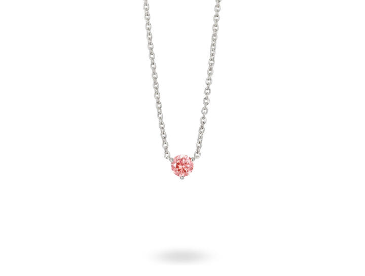 Front view of a pink 0.5 carat round brilliant solitaire pendant in 14k white gold